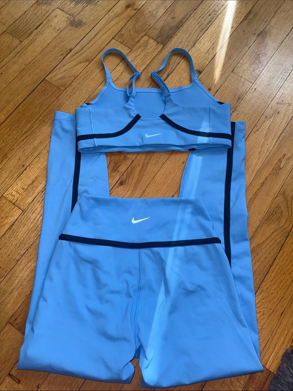 Nike Light Blue Sports Bra and Leggings Set with Dark Trim